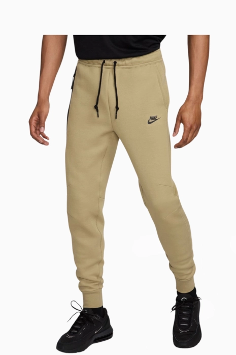 Nohavice Nike Sportswear Tech Fleece - Béžová