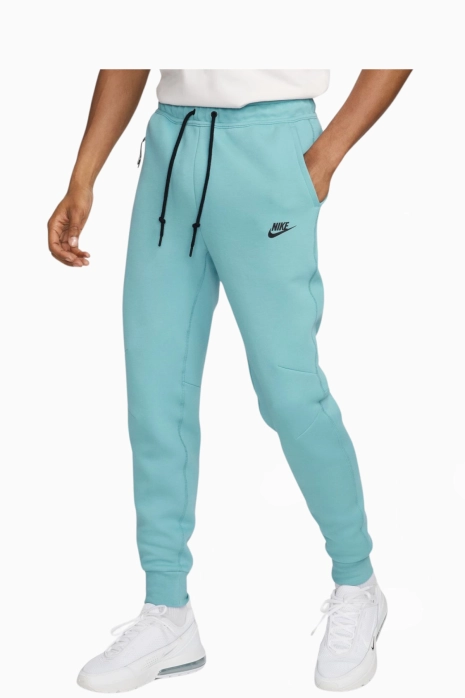 Nohavice Nike Sportswear Tech Fleece - svetlo modrá