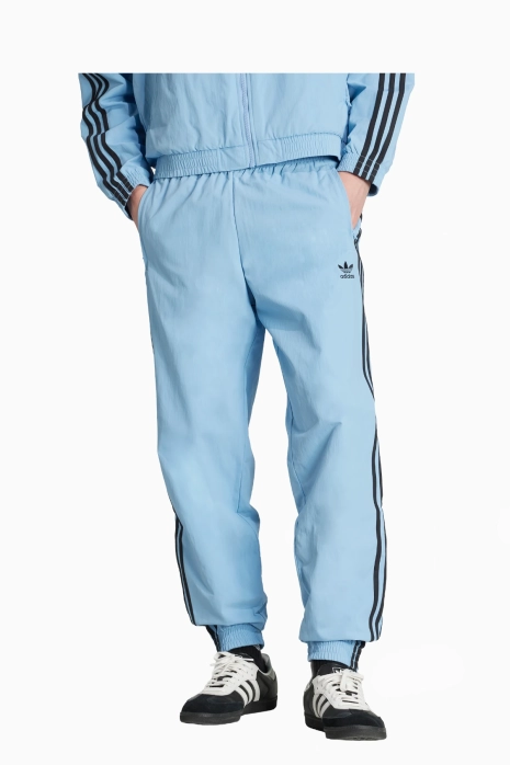 Pantaloni adidas Adicolor Woven Firebird - albastru deschis
