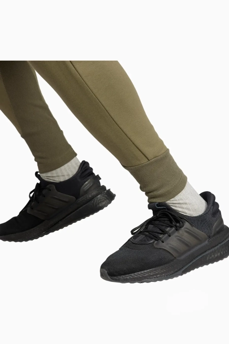 adidas gazelle silver green womens adidas Z.N.E Open Hem Woven Mens Pants Beige JN9030 – Shoe Palace main image 0